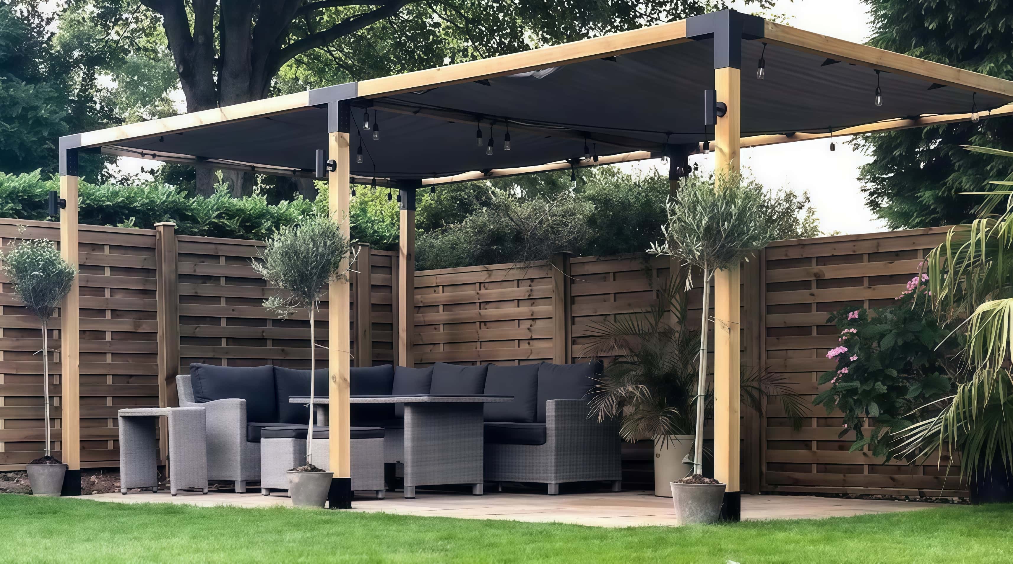 DIY backyard pergola built with galvanized steel brackets and 4x4 wood posts.