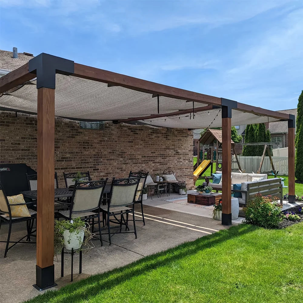 Backyard pergola with galvanized steel brackets and shade cover, perfect for outdoor dining.