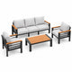 4-piece outdoor sofa set angled side view with 3-seat sofa, two chairs, gray cushions, black frame, and wood-look coffee table