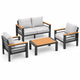 4-piece outdoor sofa set with loveseat, two chairs, gray cushions, black frame, and wood-look coffee table