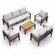 5-piece outdoor sofa set with gray cushions, black metal frames, wood-look armrests, and matching coffee table 