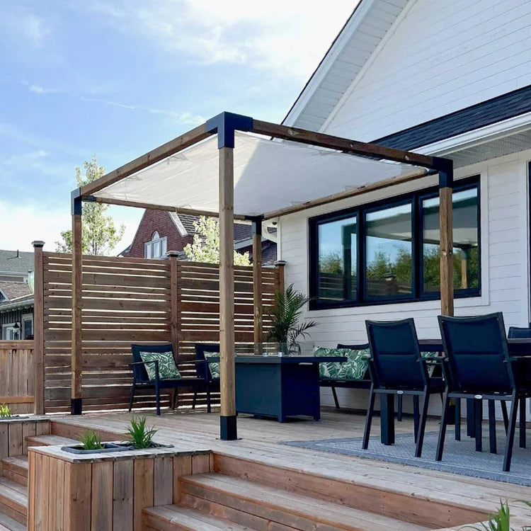 DIY pergola bracket kit installed on wooden deck with 4x4 wood posts and shade cloth.