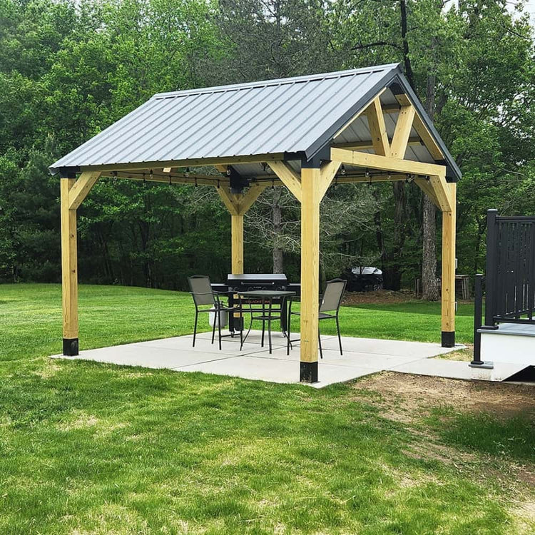 Metal roof pergola pavilion built with pergola bracket kit in backyard