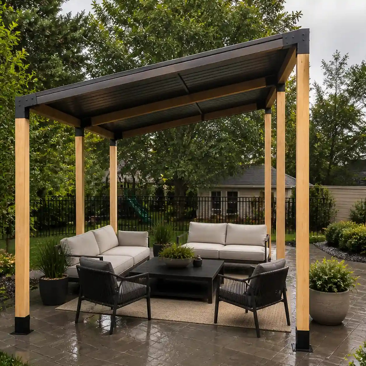 Wooden post patio pergola with a dark metal roof and outdoor lounge seating